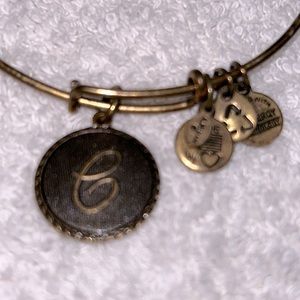 Alex and Ani upcycled bangle with gold copper metals and a C charm.
